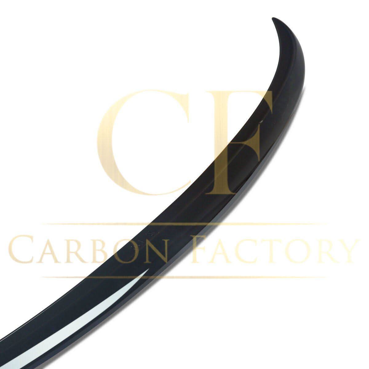 Gloss black MP Style boot spoiler for BMW F10 5 Series (2010-2017), showing the sleek, aerodynamic design and fitment details.