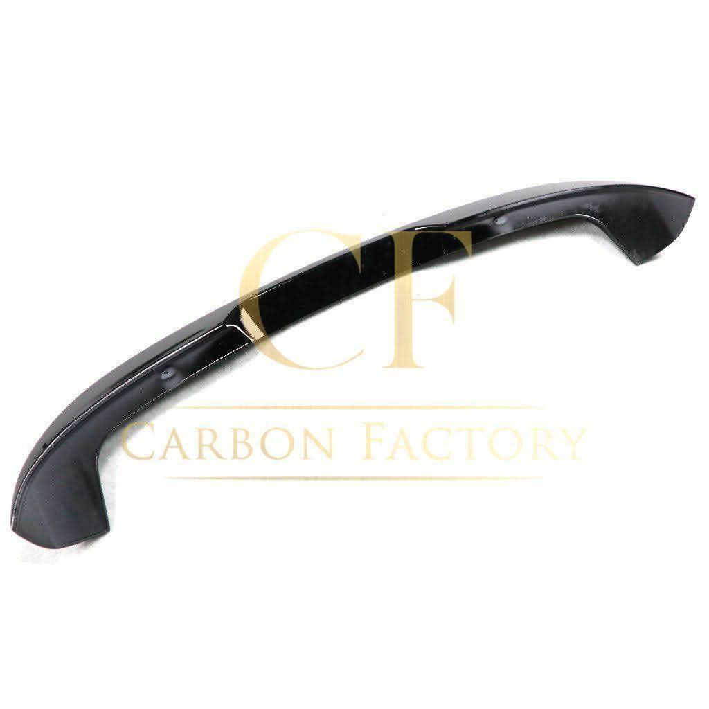 Gloss black roof spoiler for BMW F20 F21 1 Series, MP Style, installed on the car's rear roof area.