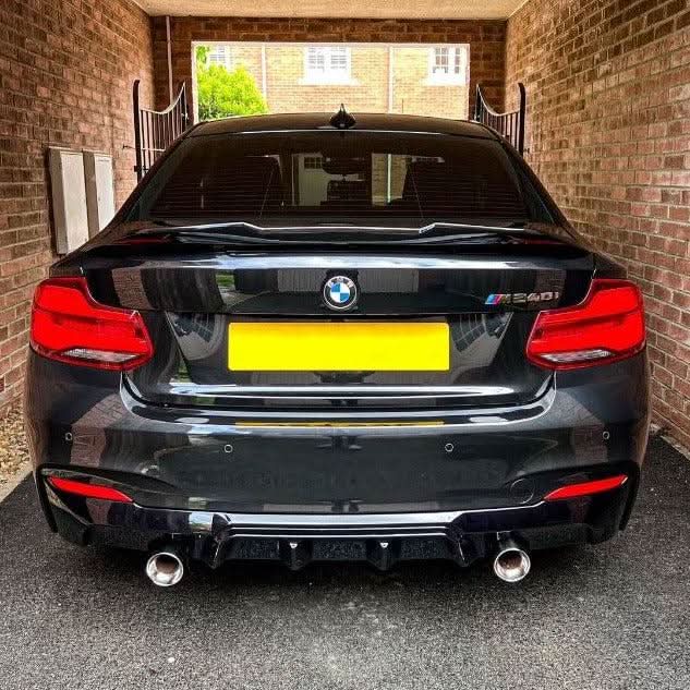 Gloss black PSM style boot spoiler for BMW F22 2 Series and F87 M2, enhancing rear sporty appearance.