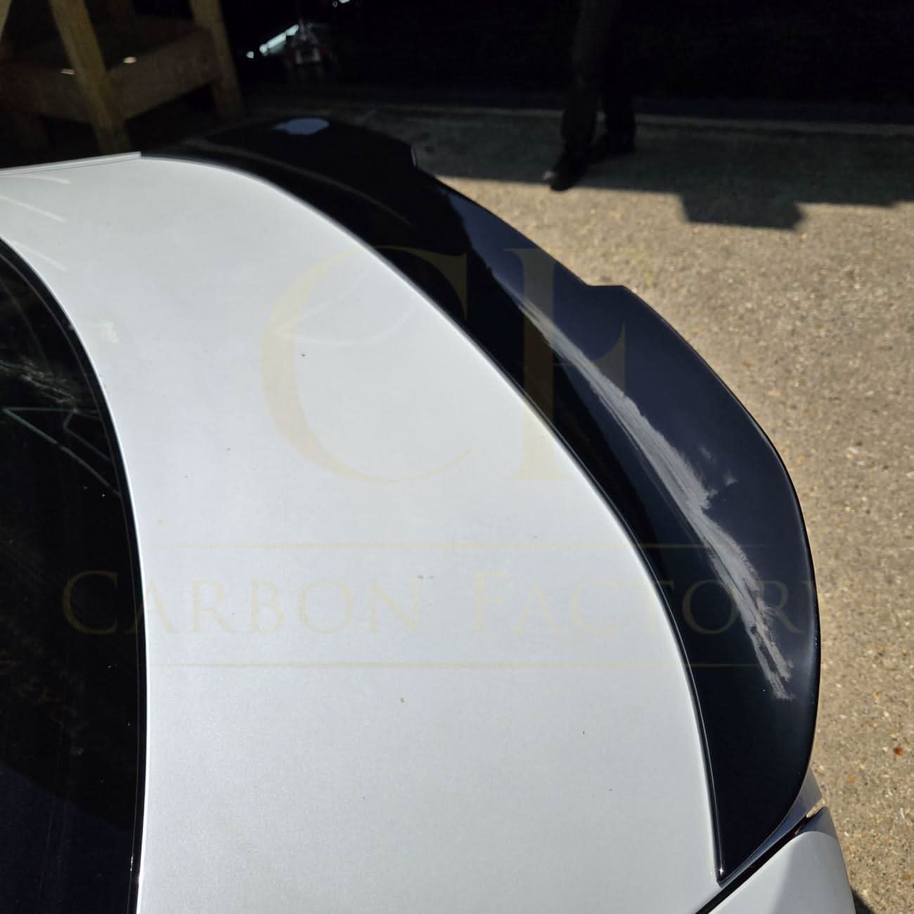 Gloss black PSM-style boot spoiler for BMW F22 2 Series and F87 M2, enhances sporty look and aerodynamics.