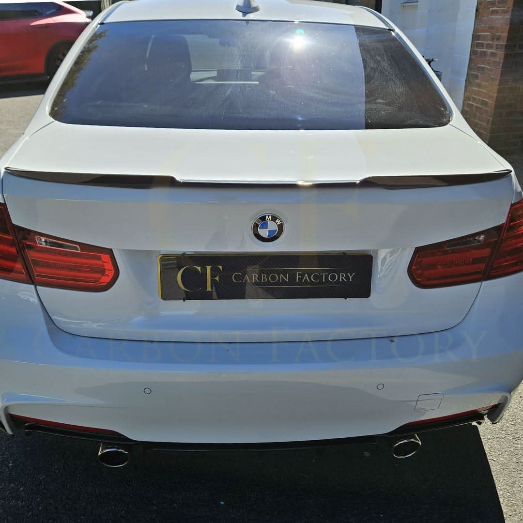Gloss black V-style boot spoiler for BMW 3 Series F30 F80 saloon and M3 models, enhances sporty look and aerodynamics.
