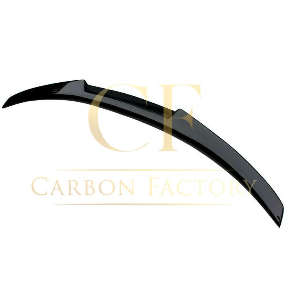 Gloss black V-style boot spoiler for BMW 4 Series F32 coupe, enhancing sporty look and aerodynamics.