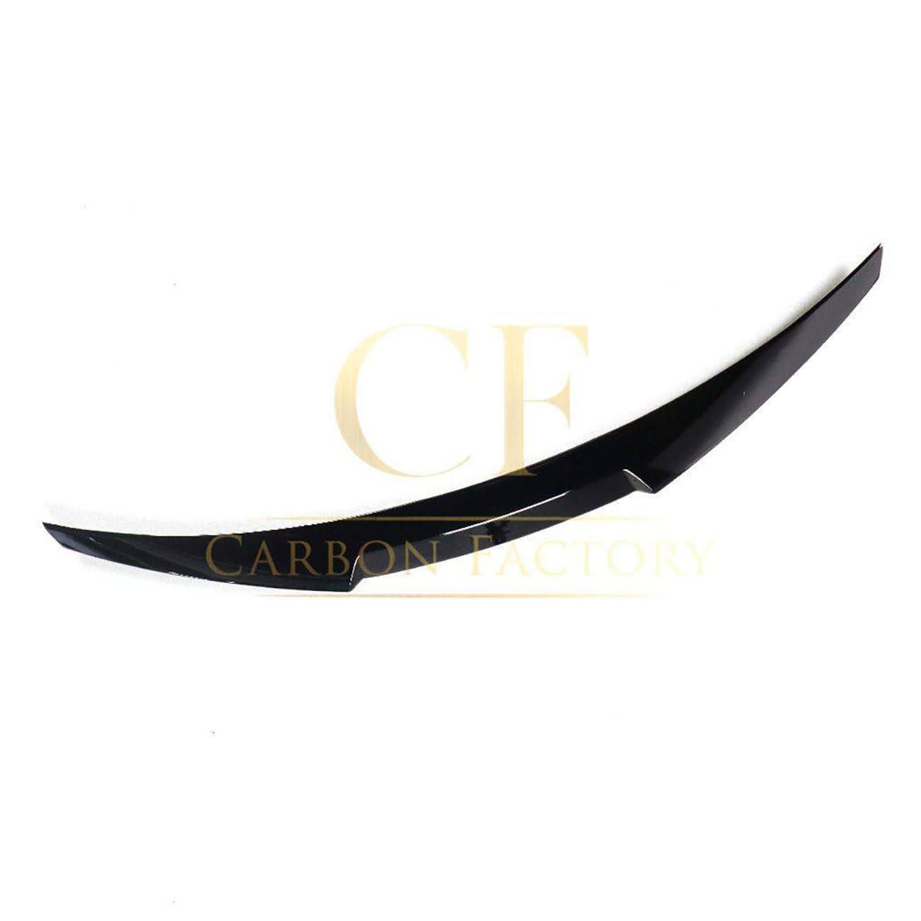 Gloss black V-style boot spoiler for BMW G30 5 Series and F90 M5, enhances rear aerodynamic look and sporty appearance.