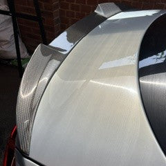 Carbon fibre boot spoiler for VW Passat CC B7 (2011-2018), enhances aerodynamics and sporty appearance.