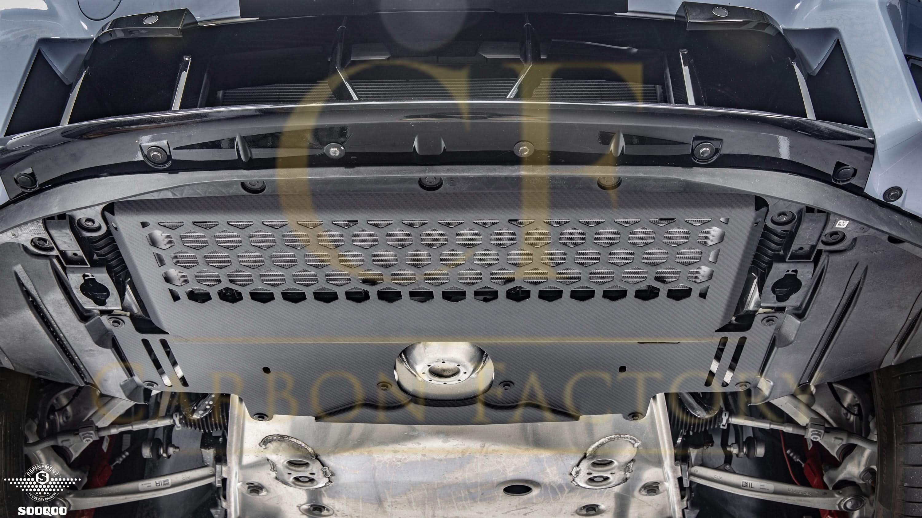 BMW G87 M2 DS Style Pre-Preg Carbon Fibre Oil Cooler Guard exterior trim by Carbon Factory, showcasing sleek black carbon fiber design.