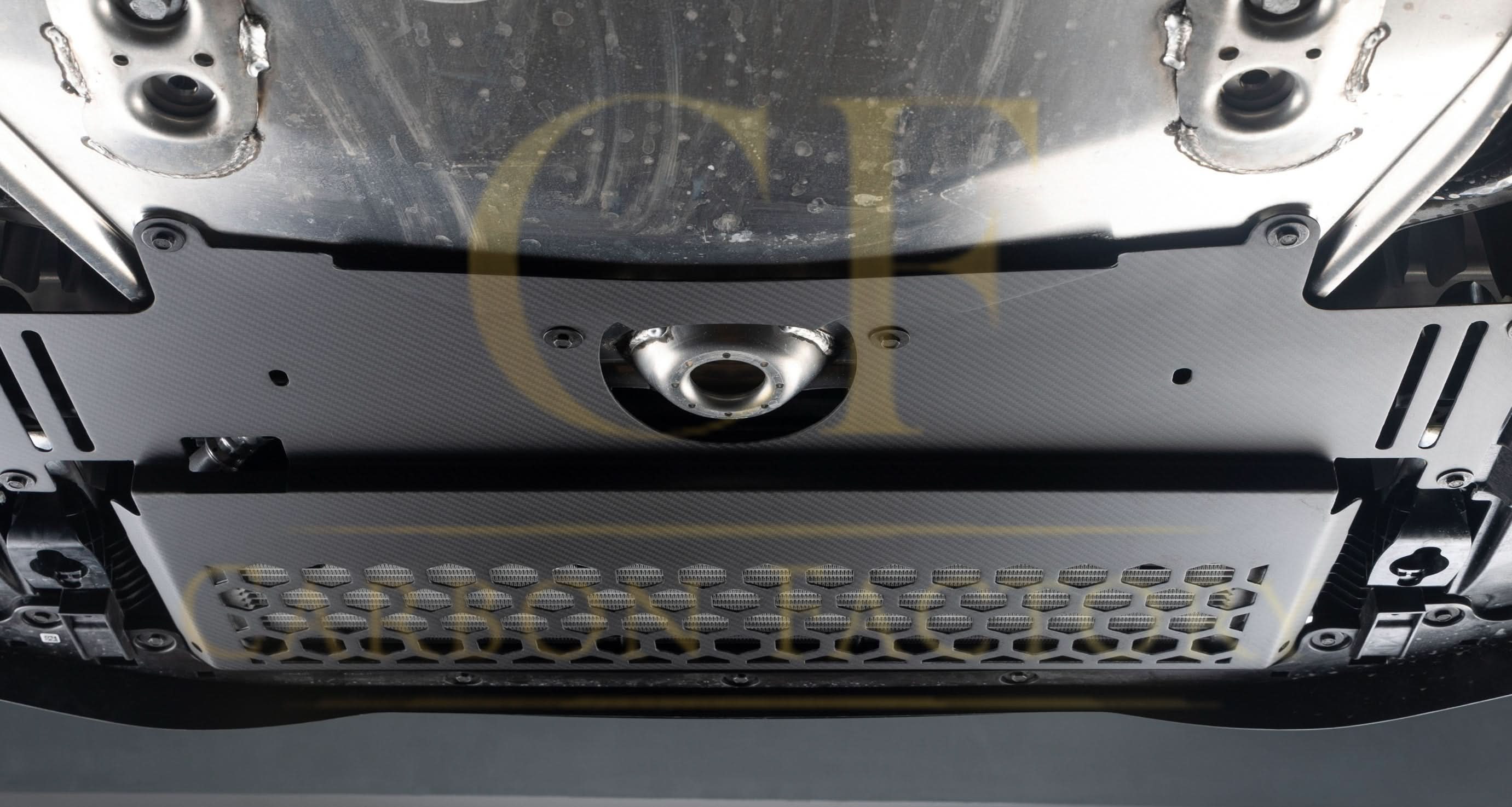 BMW G87 M2 DS Style Pre-Preg Carbon Fibre Oil Cooler Guard exterior trim by Carbon Factory, showcasing the sleek carbon fiber design.