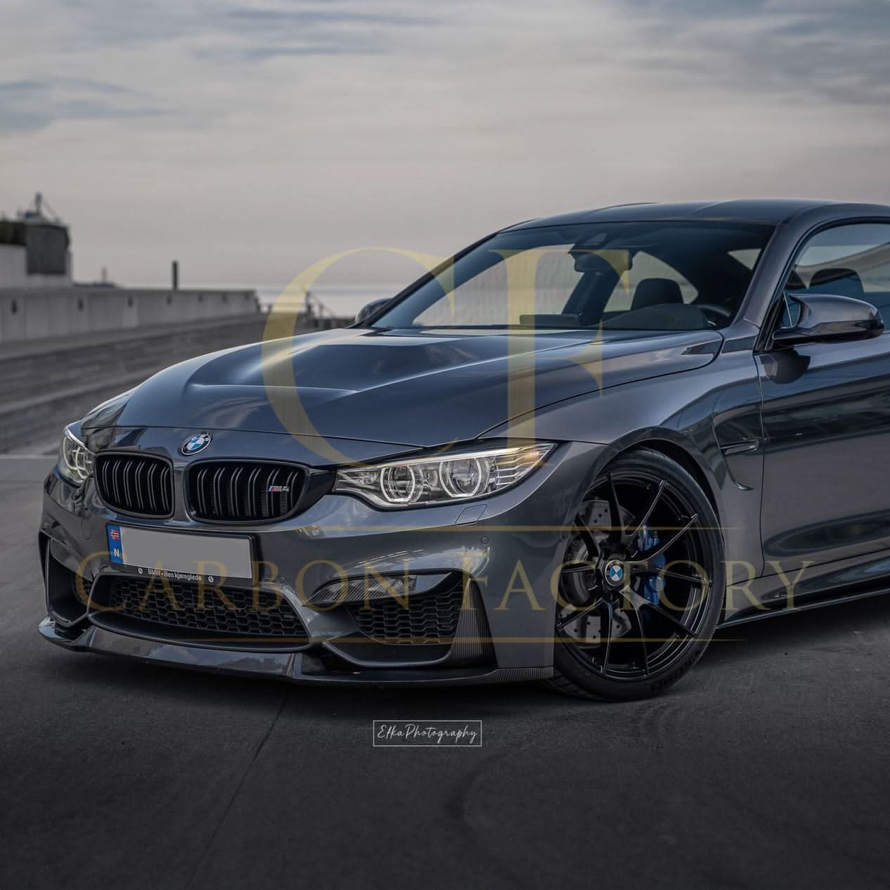 OEM-style carbon fibre front bumper trims for BMW F80 M3, F82 F83 M4, made by Pre-Preg Carbon, shown on vehicle exterior.