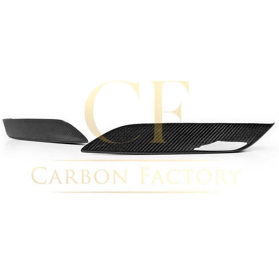OEM-style carbon fibre front bumper trims for BMW F80 M3, F82 F83 M4, exterior trims by Pre-Preg Carbon, shown on vehicle.
