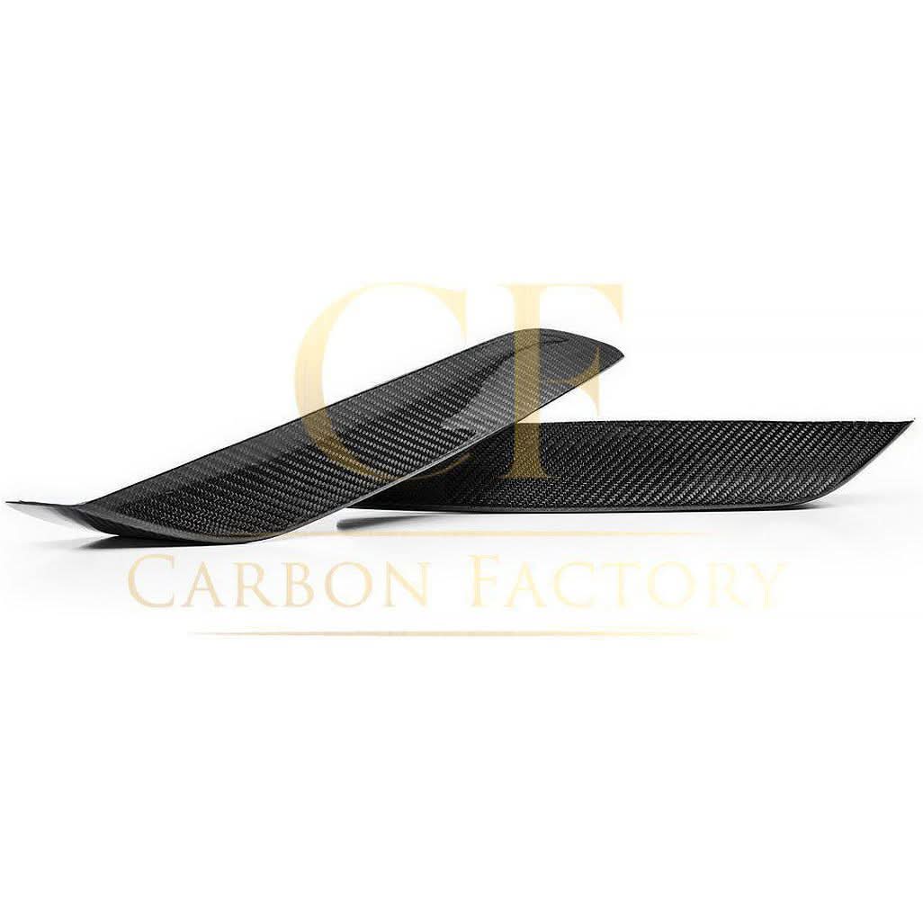 OEM-style carbon fibre front bumper trims for BMW F80 M3 F82 F83 M4, made by Pre-Preg Carbon, shown on vehicle exterior.