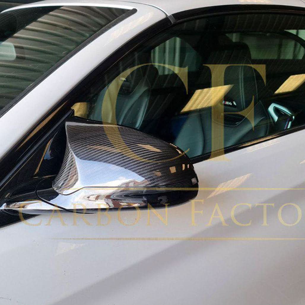 Pre-Preg Carbon fibre replacement mirror cover for BMW F80 M3 F82 F83 M4 F87 M2 Comp, right-hand drive, showcasing sleek design