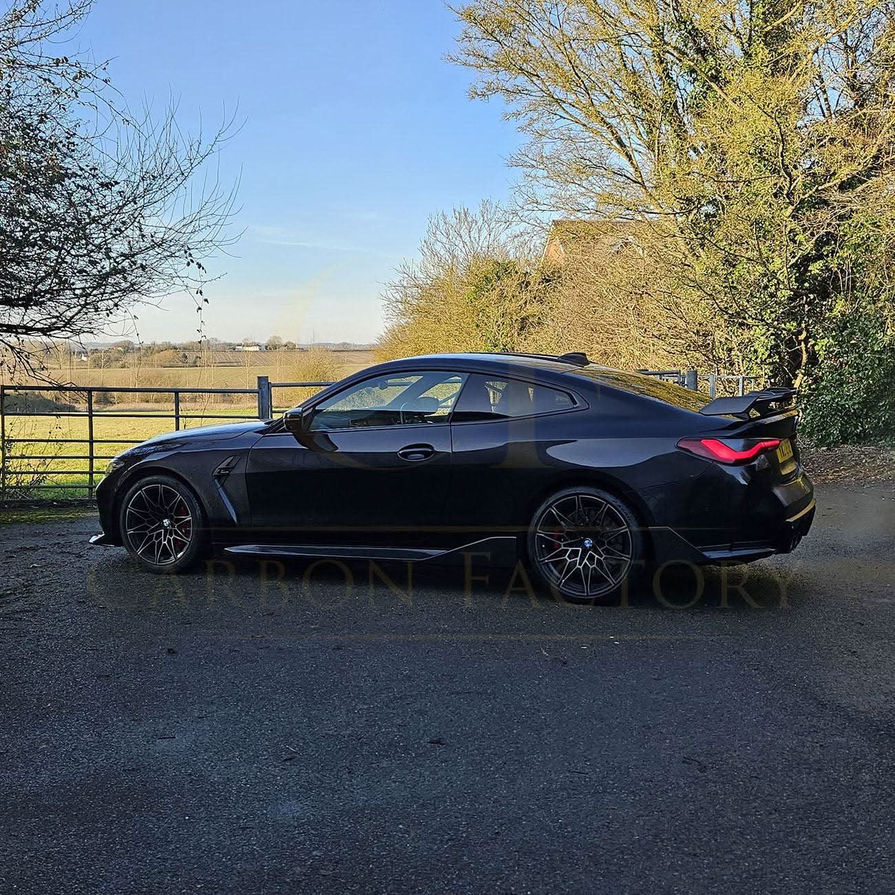 Pre-Preg Carbon fibre side skirts for BMW G82 G83 M4, stylish aerodynamic enhancements with a sleek carbon finish.
