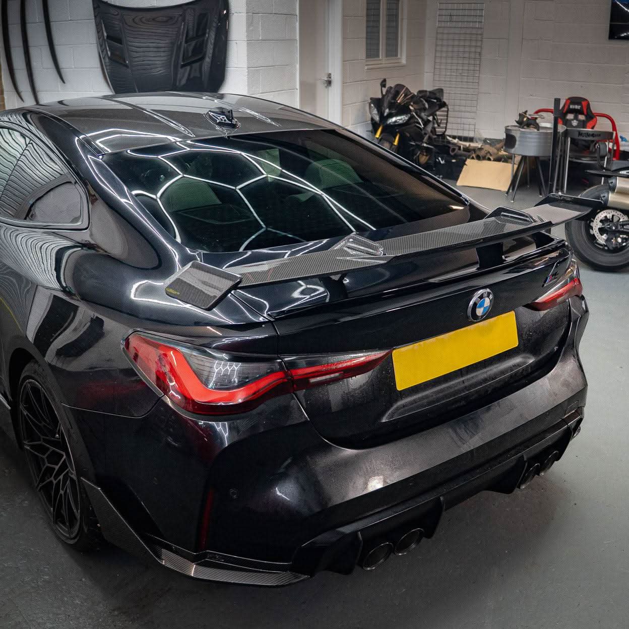 Pre-Preg Carbon fibre BMW G80 M3 G82 M4 boot spoiler, aerodynamic design, lightweight carbon fiber material, fits 2021-present models.