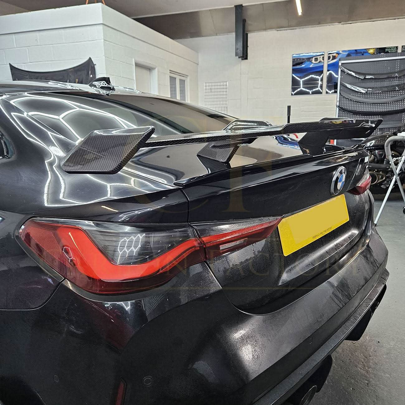 Pre-Preg Carbon fibre boot spoiler for BMW G80 M3 and G82 M4, showcasing sleek aerodynamic design and high-quality finish.