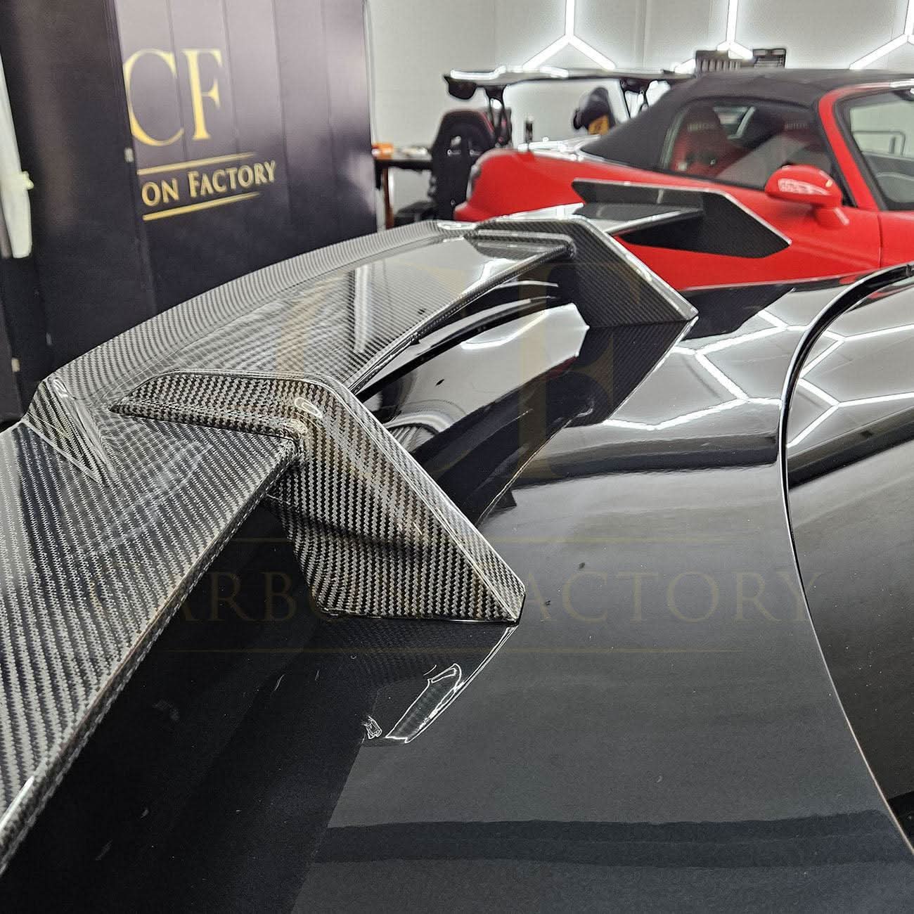 Pre-Preg Carbon fiber boot spoiler for BMW G80 M3 and G82 M4, showcasing sleek aerodynamic design on the vehicle's trunk lid.