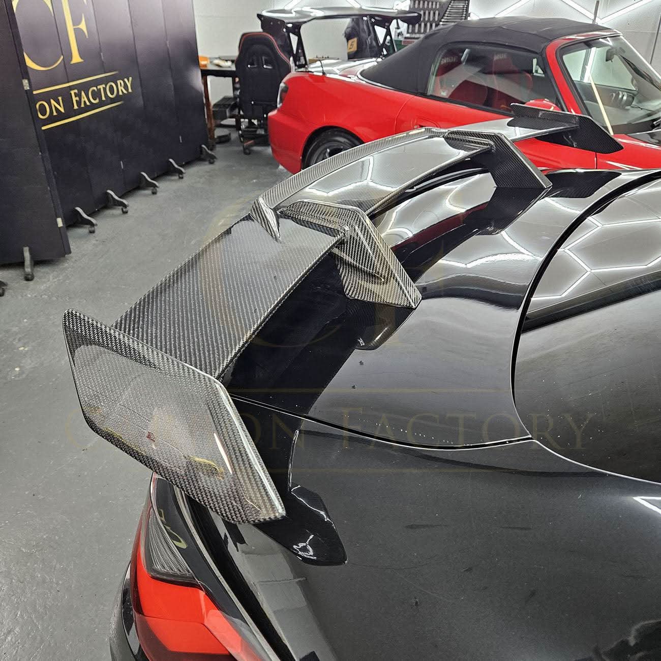 Pre-Preg Carbon fibre boot spoiler for BMW G80 M3 and G82 M4, enhances aerodynamics and sporty look.