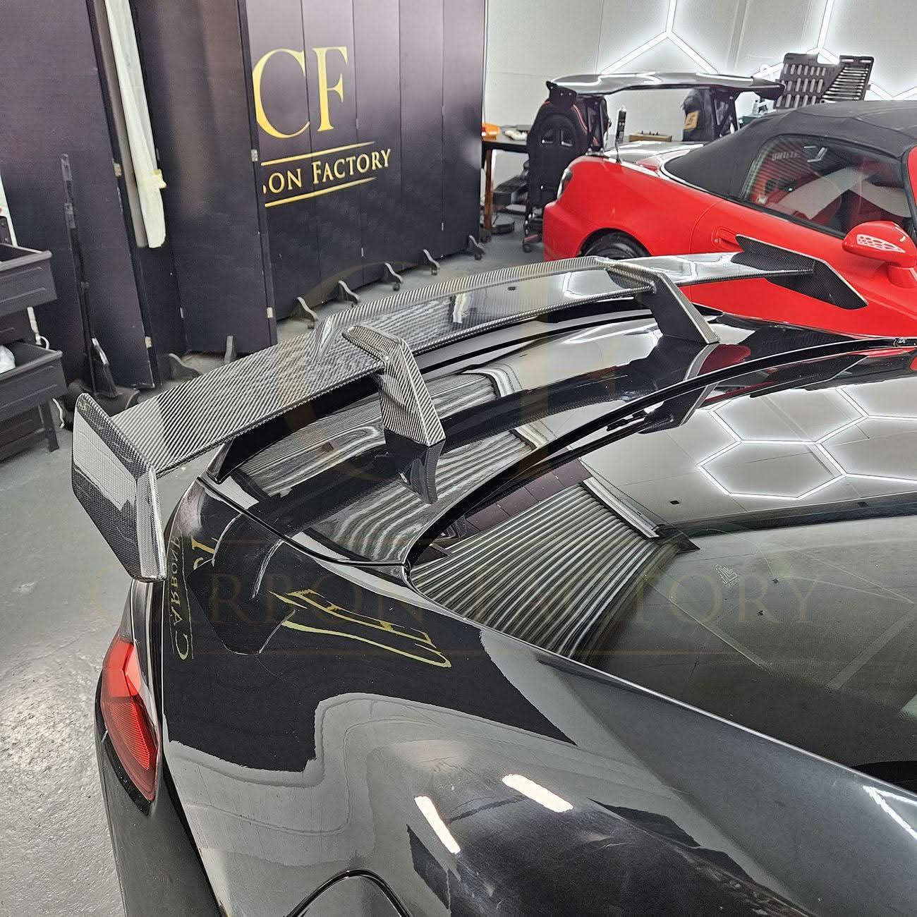 Pre-Preg carbon fibre boot spoiler for BMW G80 M3 and G82 M4, showcasing a sleek, aerodynamic design.