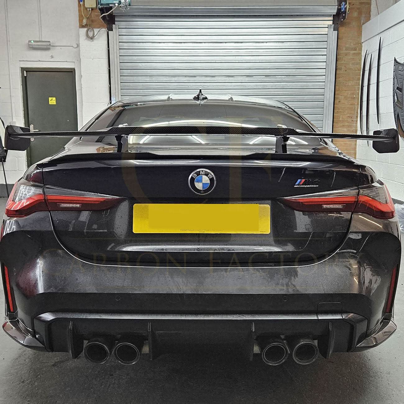 Pre-Preg Carbon fibre boot spoiler for BMW G80 M3 G82 M4, showcasing sleek aerodynamic design and high-quality craftsmanship.