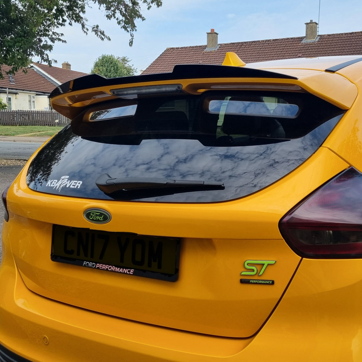 Gloss black roof spoiler for Ford Focus ST C346 MK3 2011-2018, aerodynamic car accessory visible in the image.