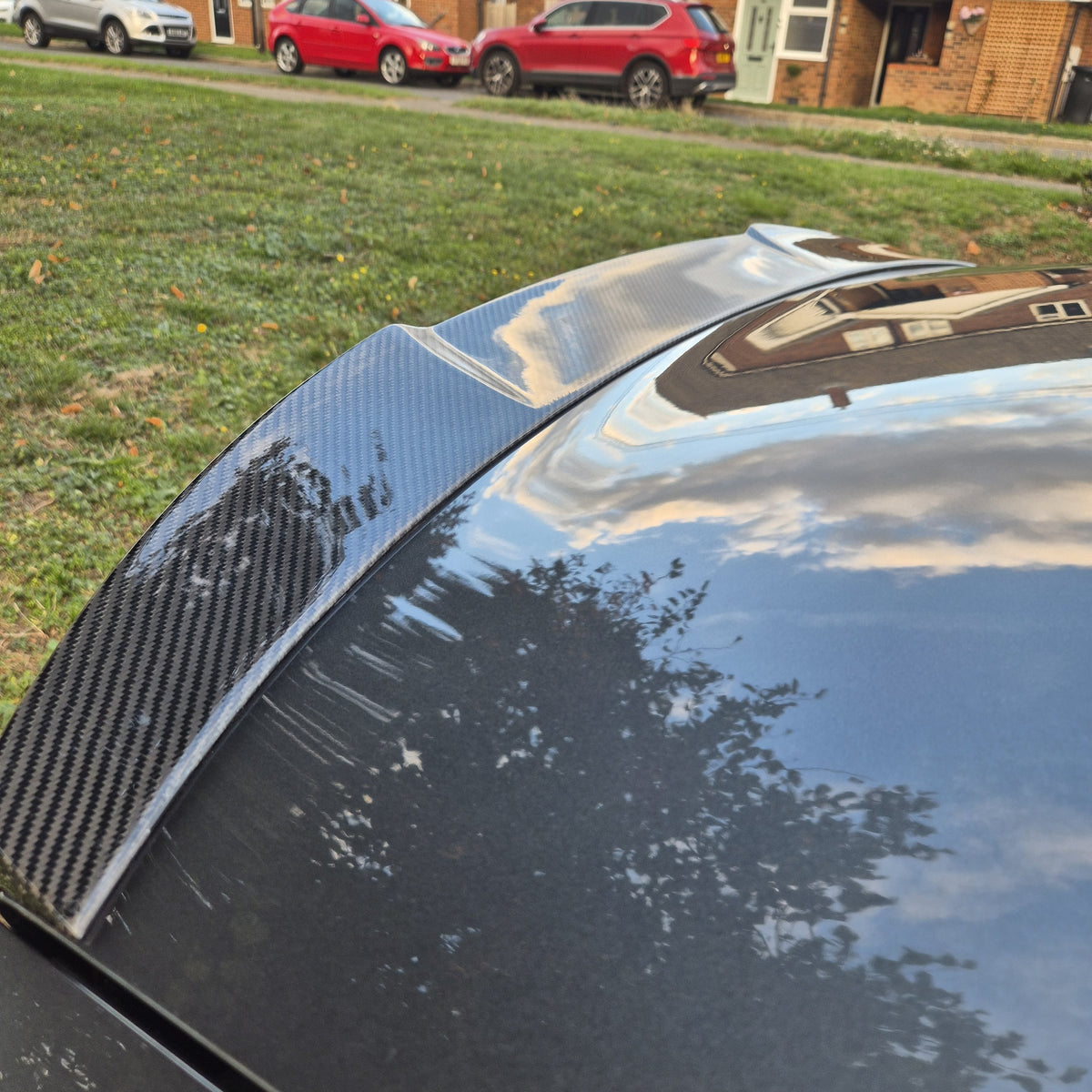 Carbon Fibre V Style boot spoiler for Audi A3 S3 RS3 saloon models 2013-2020, enhances rear aerodynamic look.
