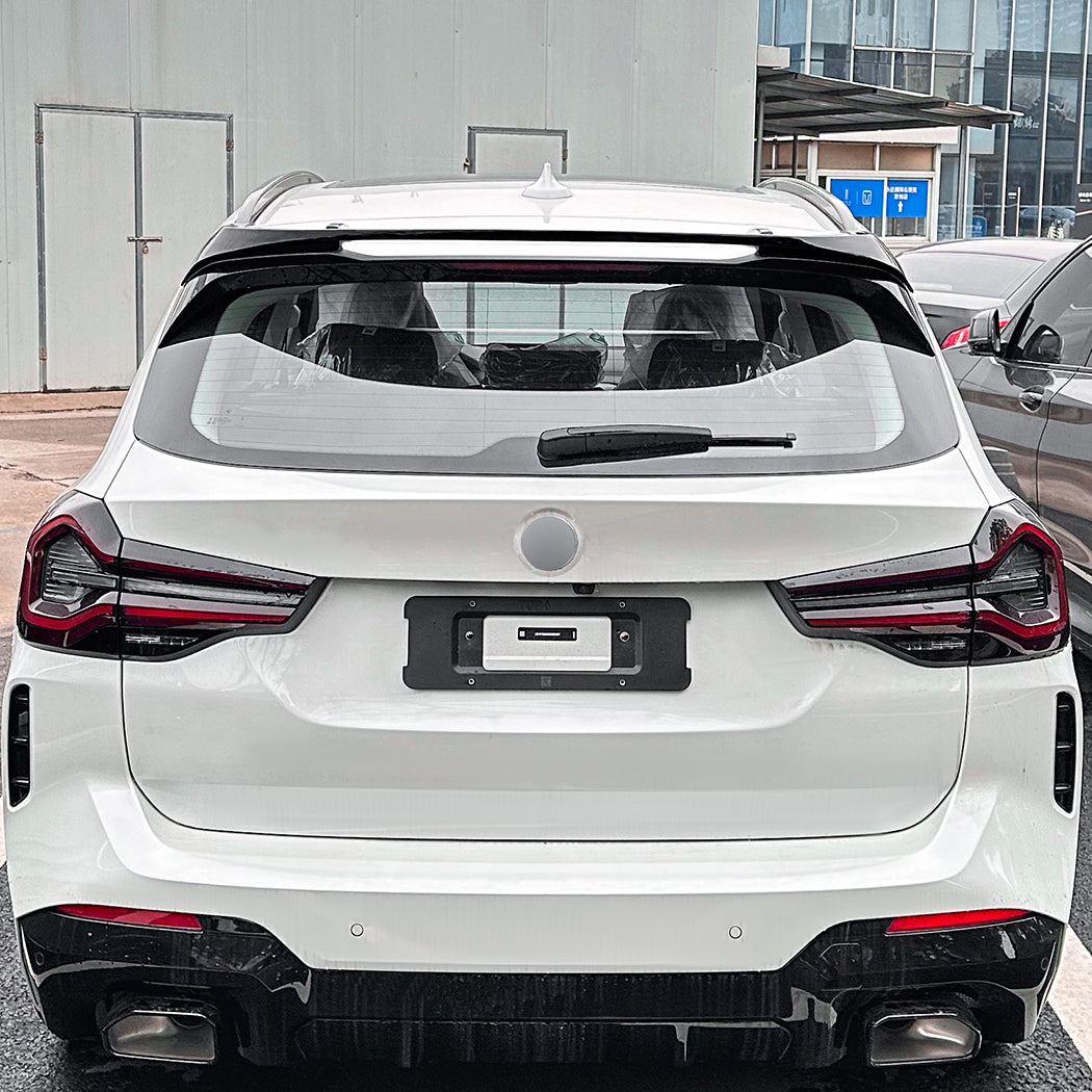 Gloss black roof spoiler for BMW G01 X3 and iX3, stylish aerodynamic accessory designed for 2018-2024 models.