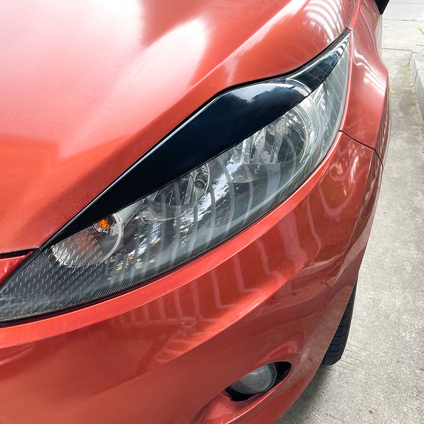 Gloss Black Headlight Trims for Ford Fiesta B299 MK7 08-12