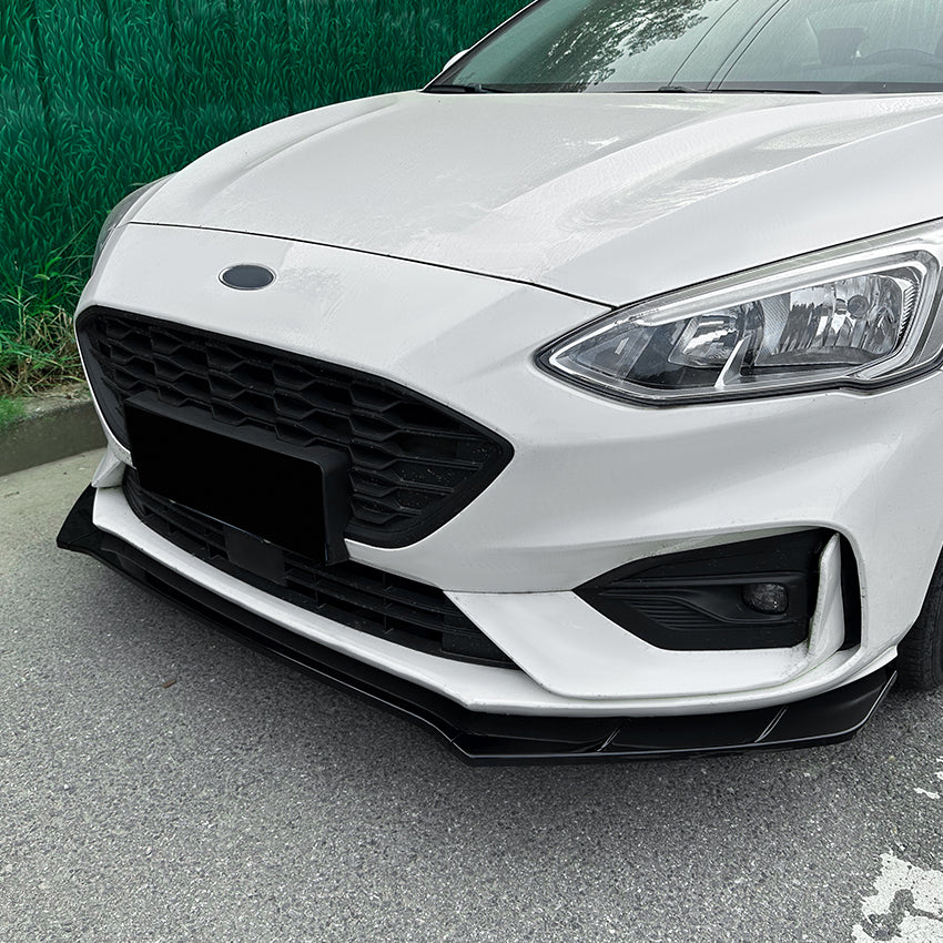 Gloss black front splitter for Ford Focus ST C519 MK4 2019-2022, showcasing the sleek aerodynamic design and glossy finish.