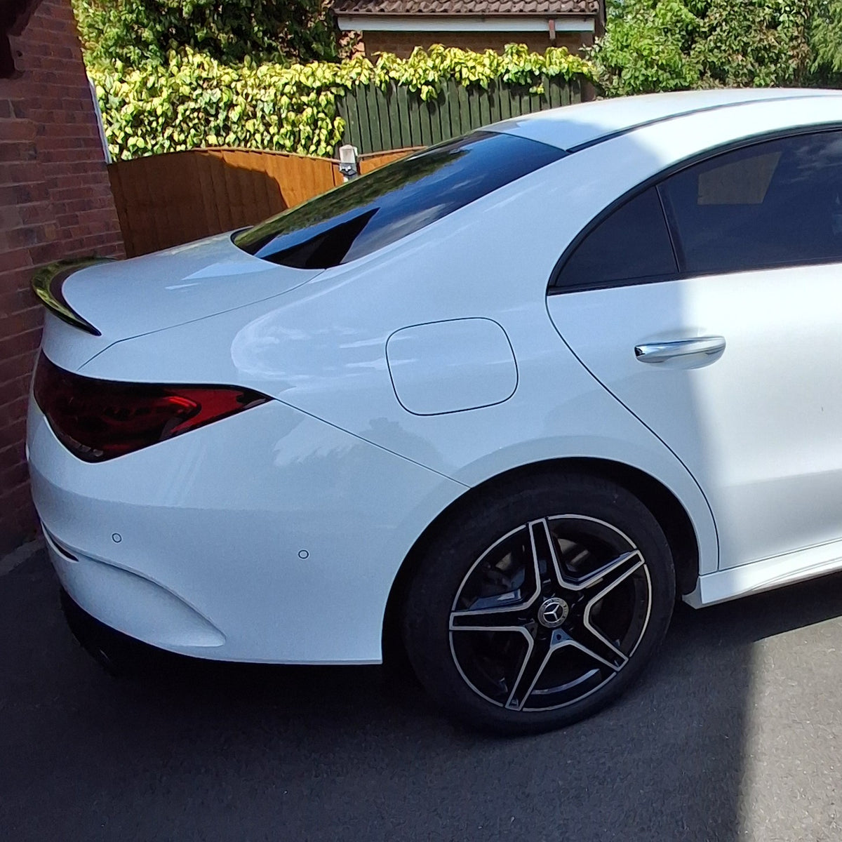 Gloss black boot spoiler for Mercedes Benz W118 CLA 2019-2026, stylish automotive accessory enhancing rear appearance.