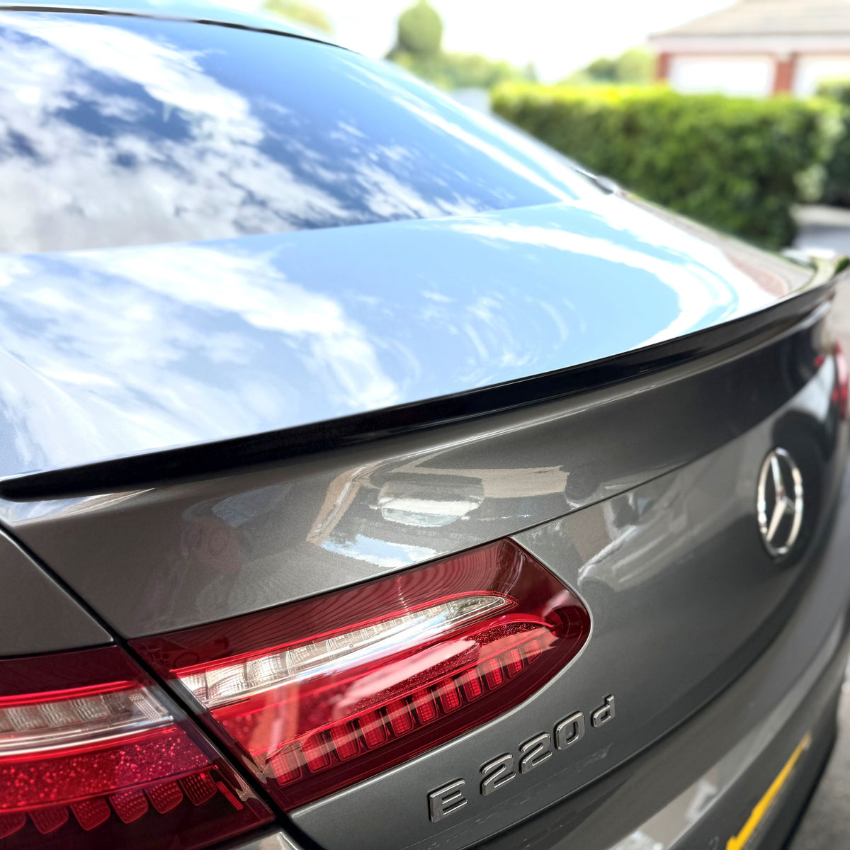 Gloss black boot spoiler for Mercedes Benz C238 E-Class Coupe 2016-2023, enhancing rear sporty appearance.