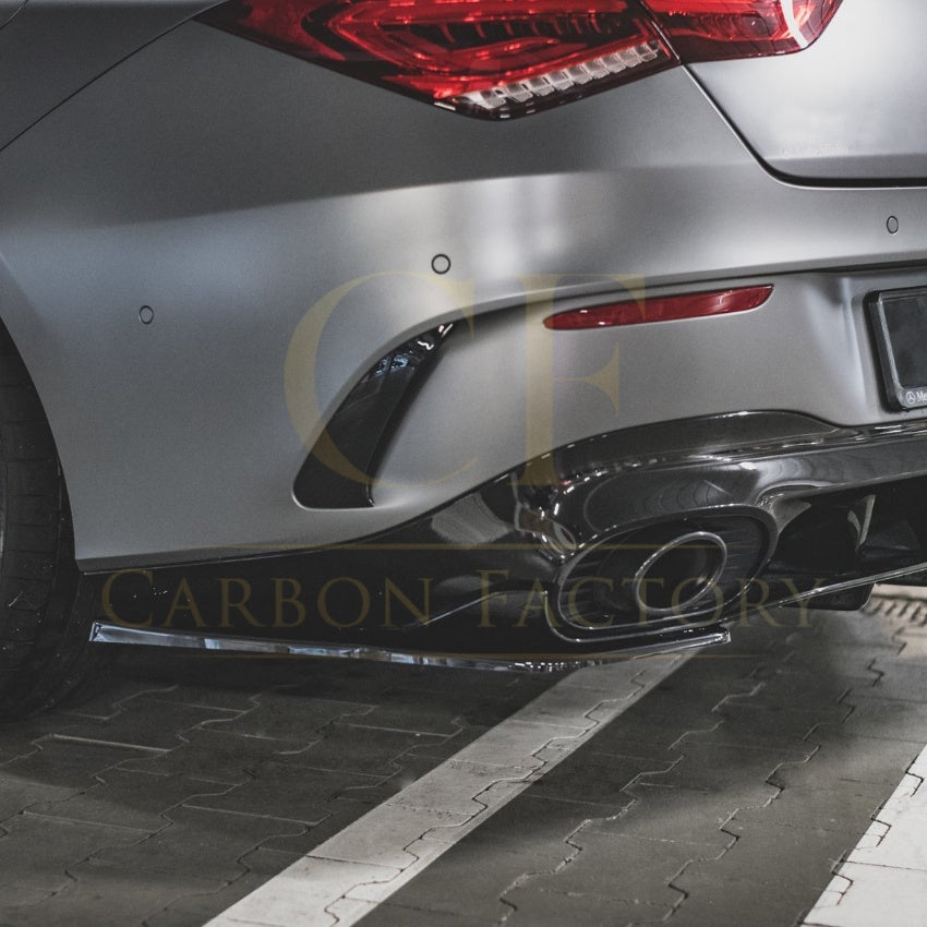 Gloss black rear bumper spats for Mercedes Benz W118 CLA45S 2019-2025, exterior trim pieces with a sleek finish.