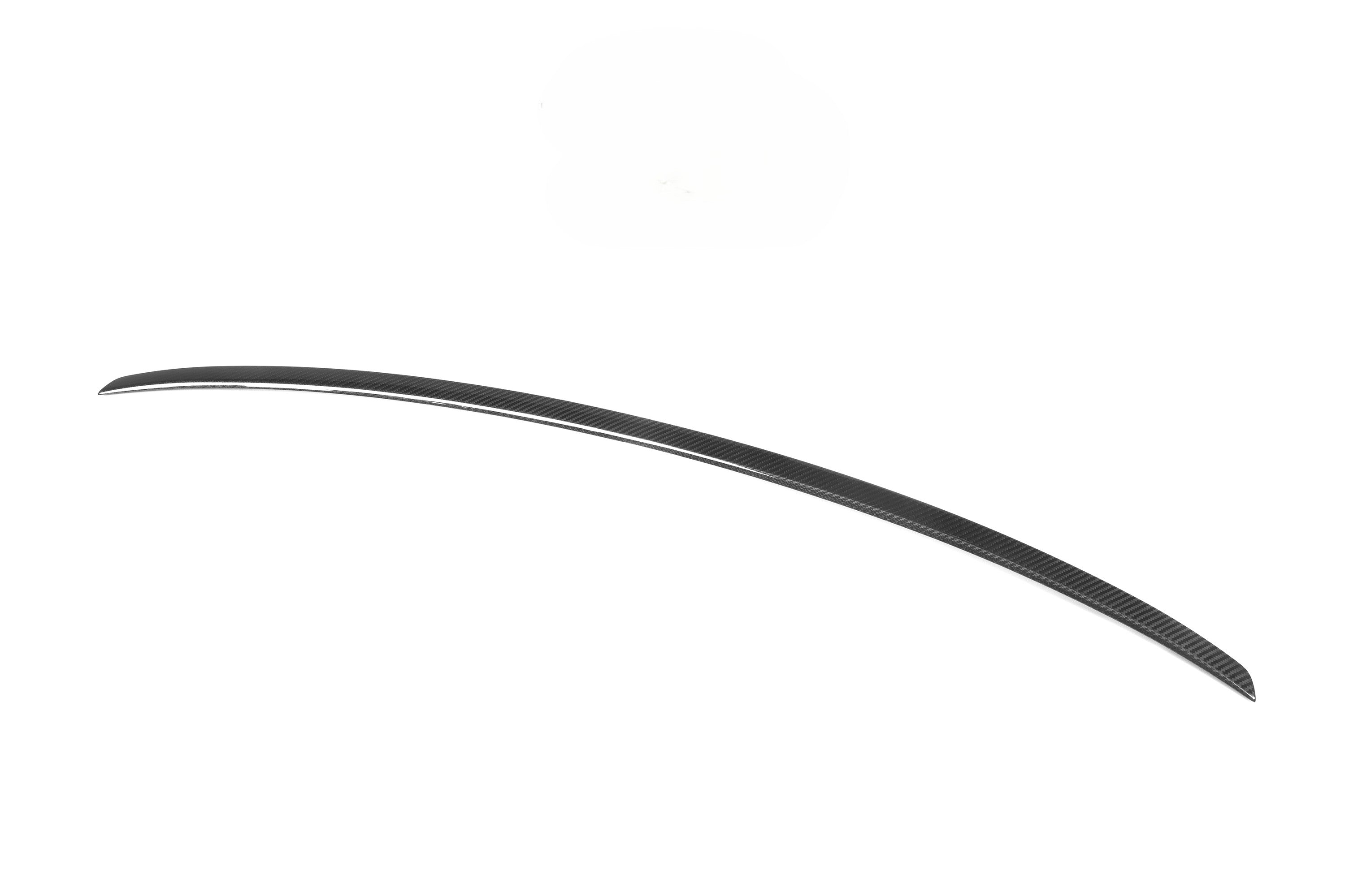 Curved black object on a white background