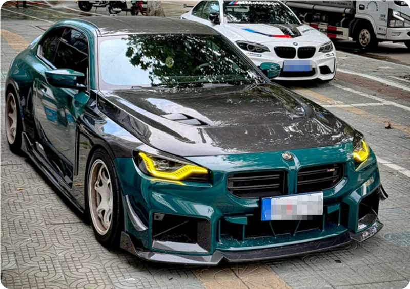 Pre-Preg Carbon fibre bonnet for BMW G87 M2 G42 Coupe, lightweight and aerodynamic car hood with sleek carbon finish.