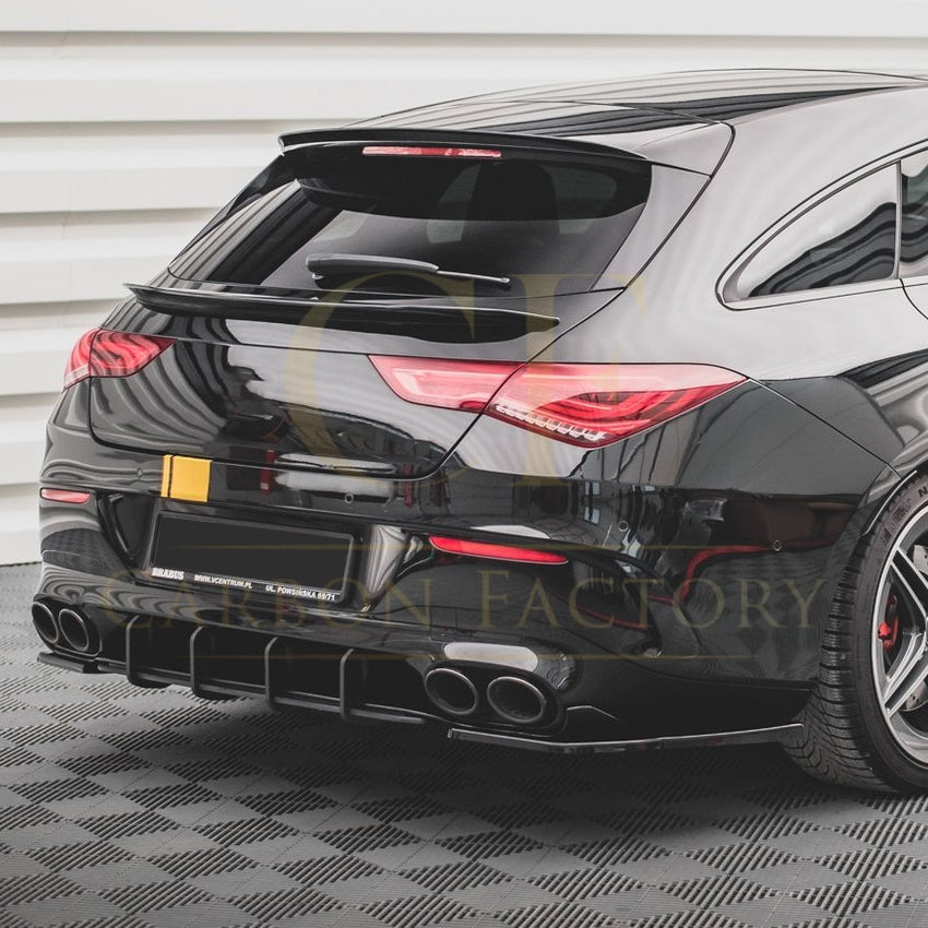 Gloss black rear bumper spats for Mercedes Benz W118 CLA45S 2019-2025 exterior trim, showing sleek glossy black finish on vehicle.