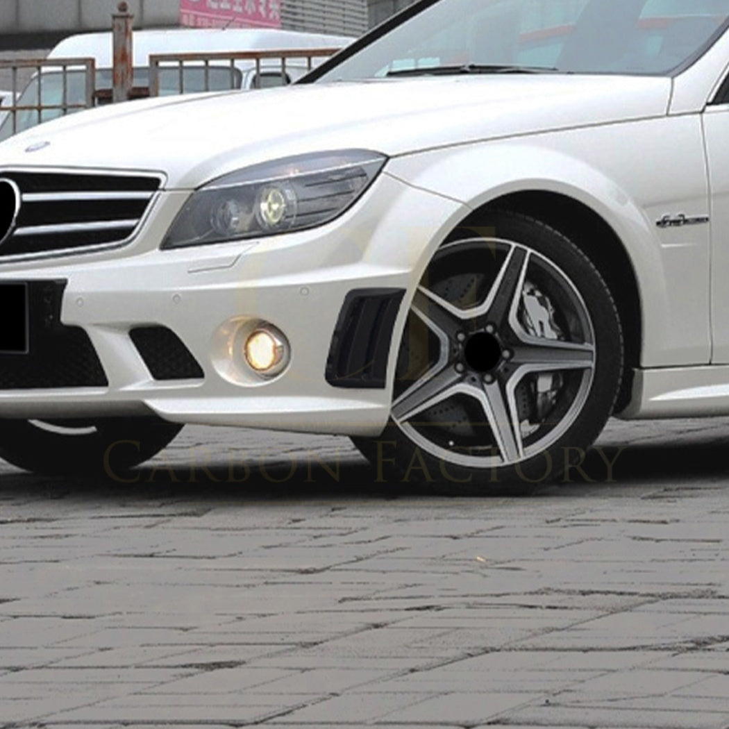 Gloss black side vents for Mercedes Benz W204 C Class AMG exterior trims, showcasing sleek finish and precise fit.