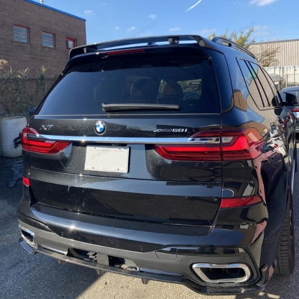 Carbon Fibre roof spoiler for BMW G07 X7, 2019-present, showcasing sleek aerodynamic design and high-quality finish.