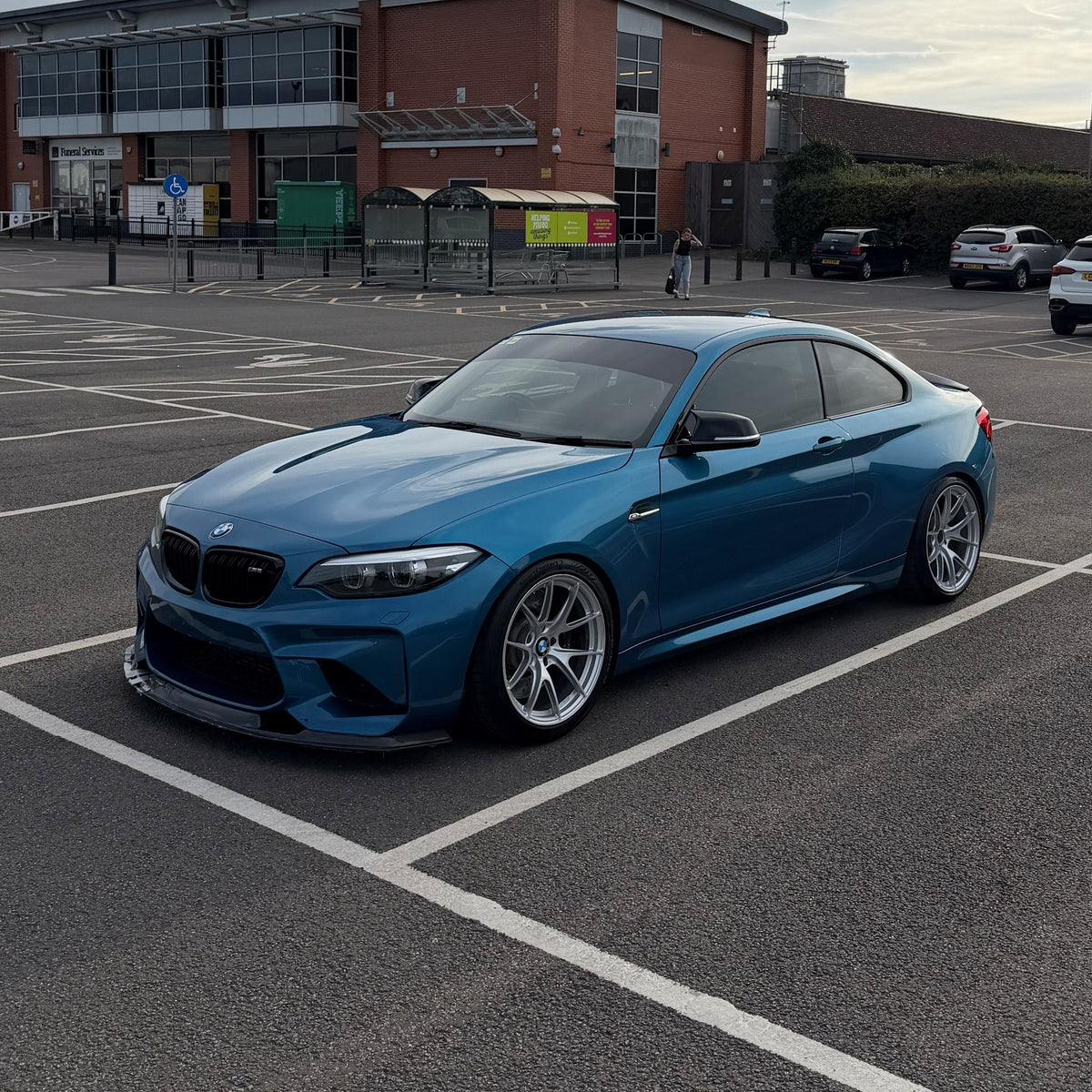 Carbon Fibre GTS Style front splitter for BMW F87 M2 OG 16-18, showcasing sleek aerodynamic design and high-quality material.