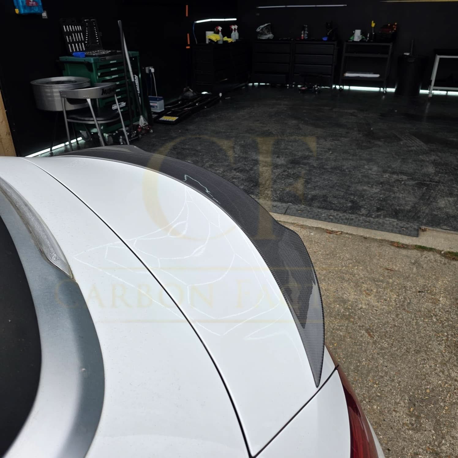 Carbon fibre boot spoiler for Mercedes Benz A205 C-Class Convertible 2015-2021, shown installed on the rear of the vehicle.