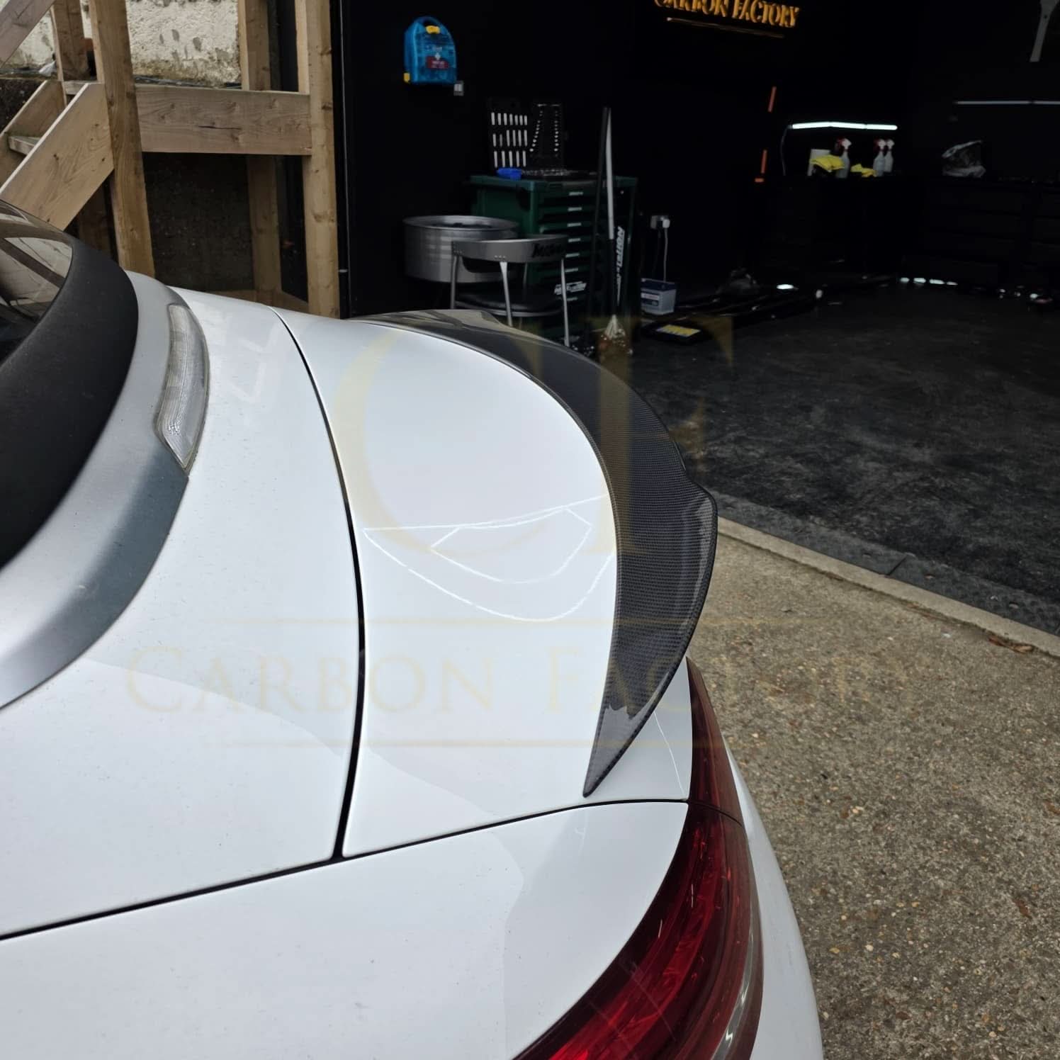Carbon Fibre boot spoiler for Mercedes Benz A205 C Class Convertible 2015-2021, showcasing sleek sporty design and high-quality material.