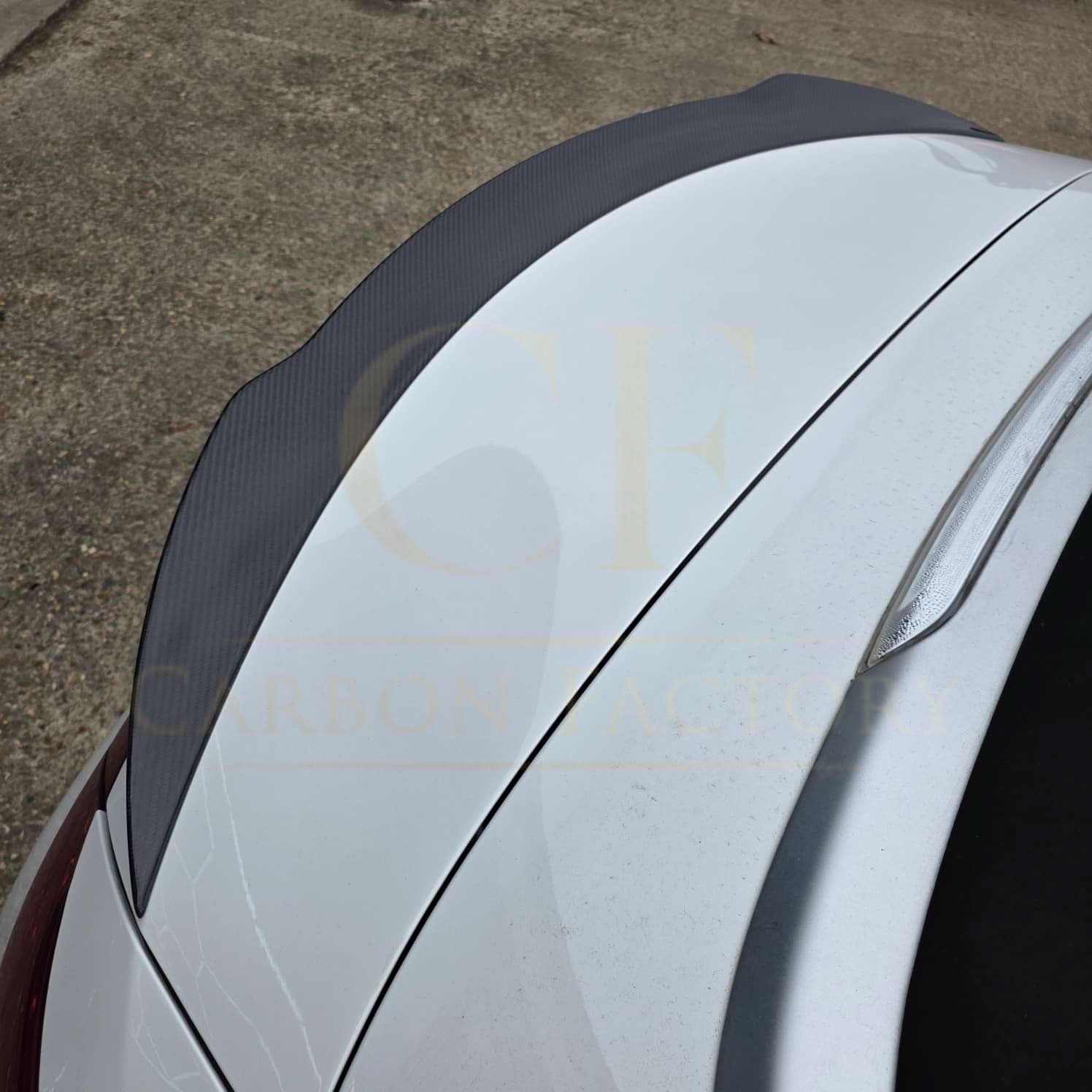 Carbon Fibre boot spoiler for Mercedes Benz A205 C Class Convertible 2015-2021, showcasing sleek aerodynamic design.