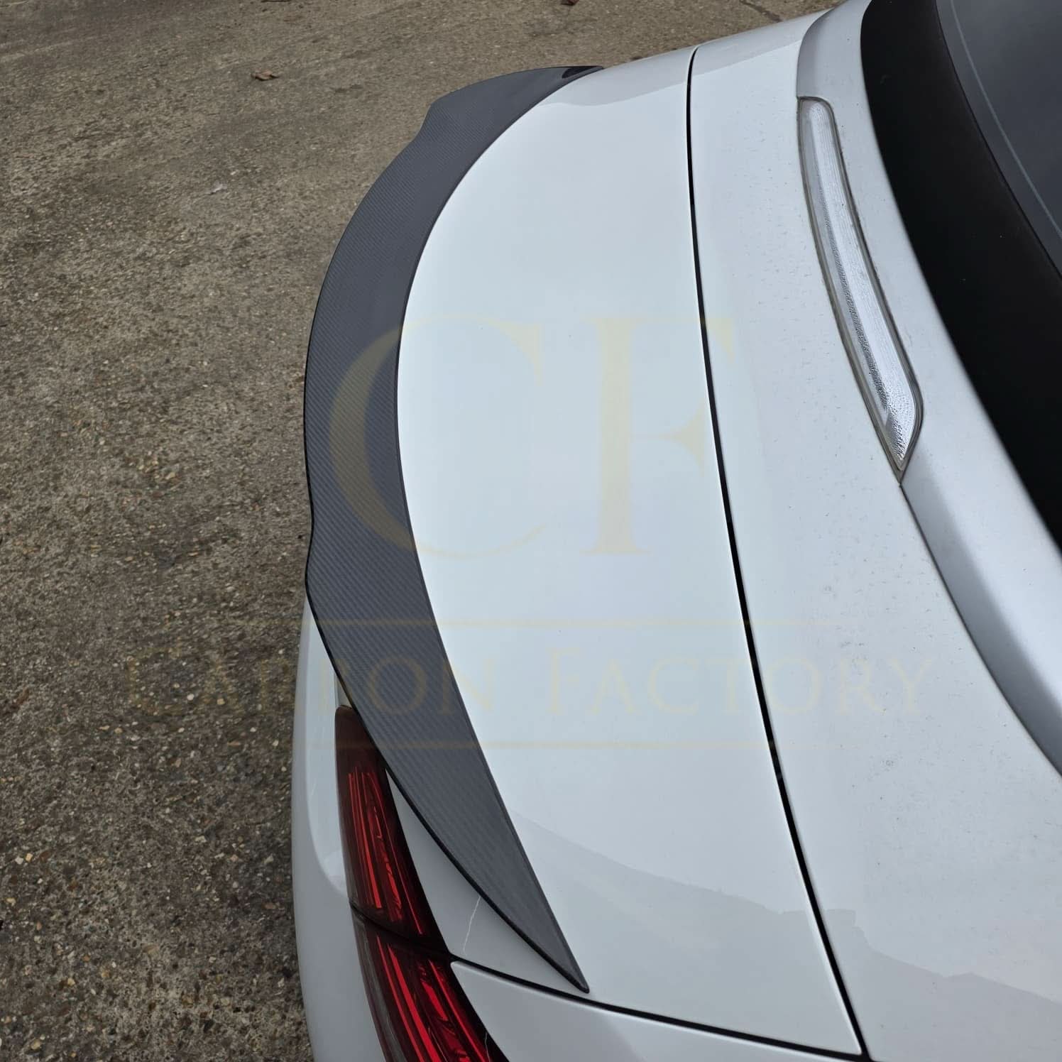Carbon Fibre boot spoiler for Mercedes Benz A205 C Class Convertible 2015-2021, shown installed on the rear trunk lid.