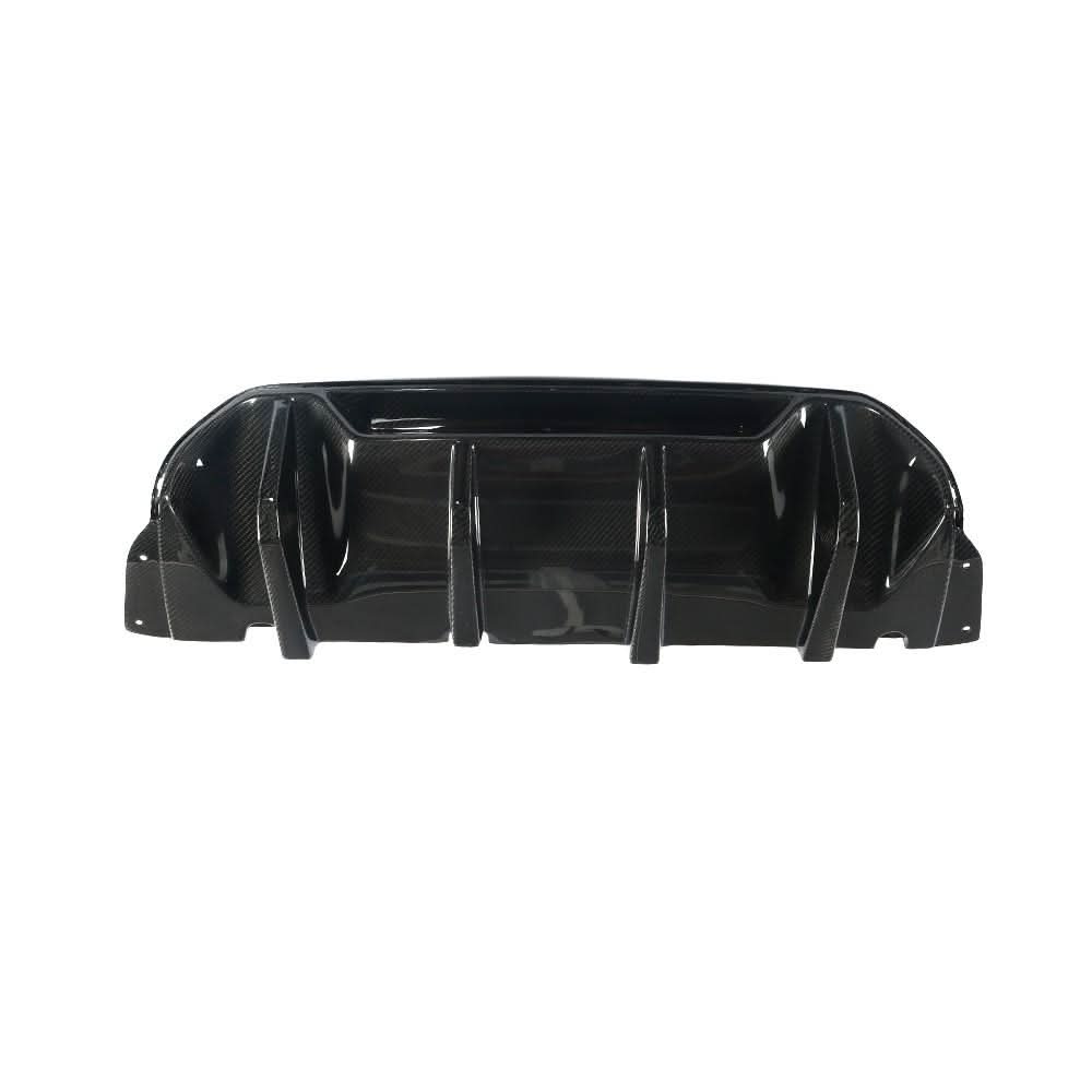 Carbon fibre rear diffuser for BMW F90 M5 (2017-2024), designed by MP Style, showcasing its sleek, aerodynamic design.