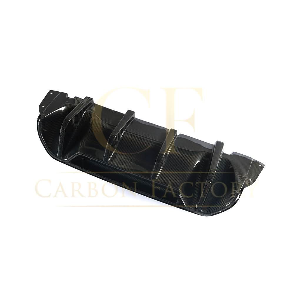 Carbon fibre rear diffuser for BMW F90 M5 2017-2024, showcasing sleek design and aerodynamic features.