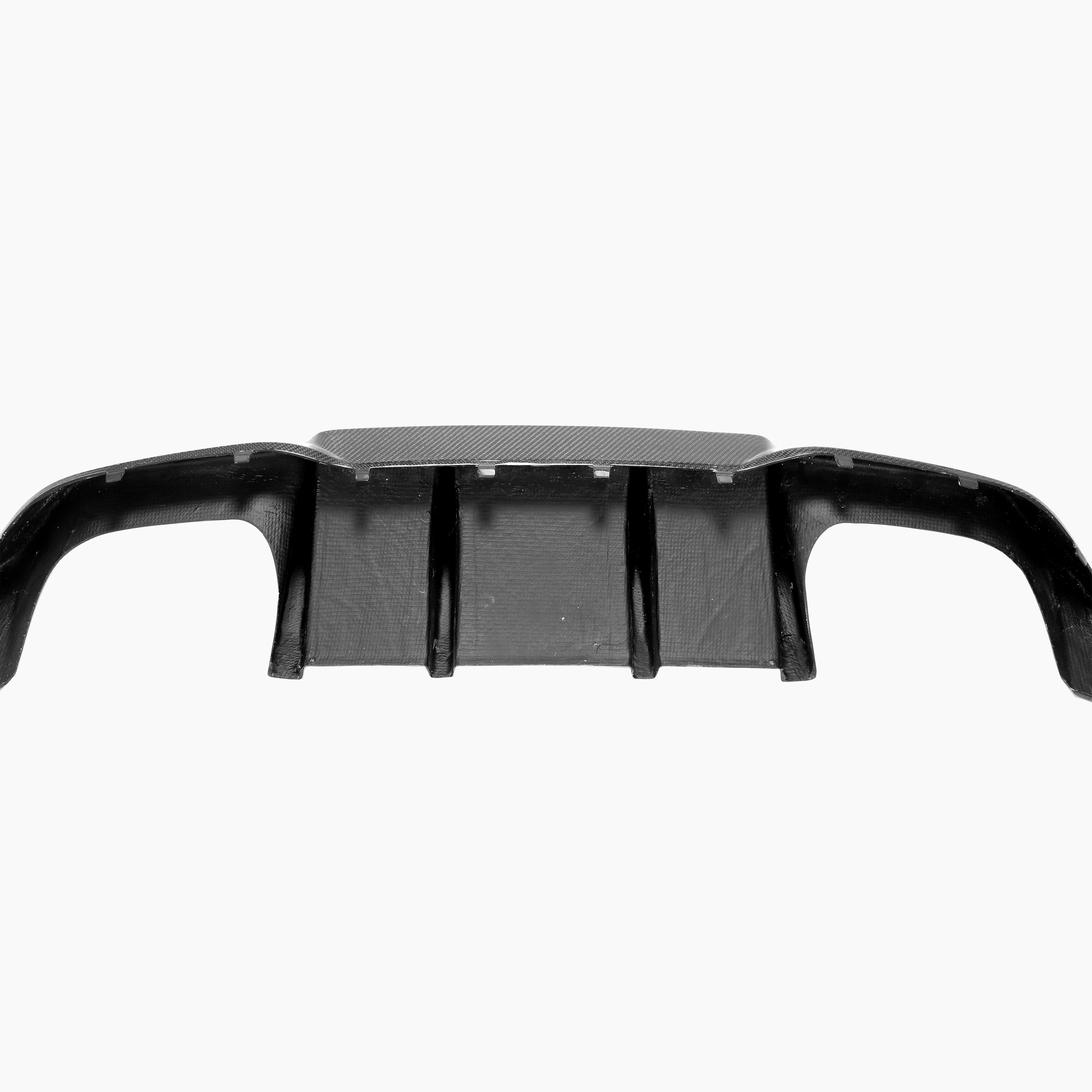 Three-piece MP3 Style carbon fiber rear diffuser installed on a BMW F87 M2, showcasing sleek, lightweight aerodynamic design.