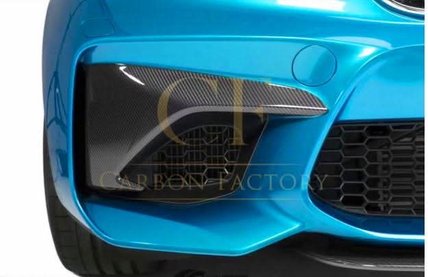 Carbon fiber front bumper covers for BMW F87 M2 2016-2021, exterior trim replacement with sleek, lightweight carbon fiber finish.