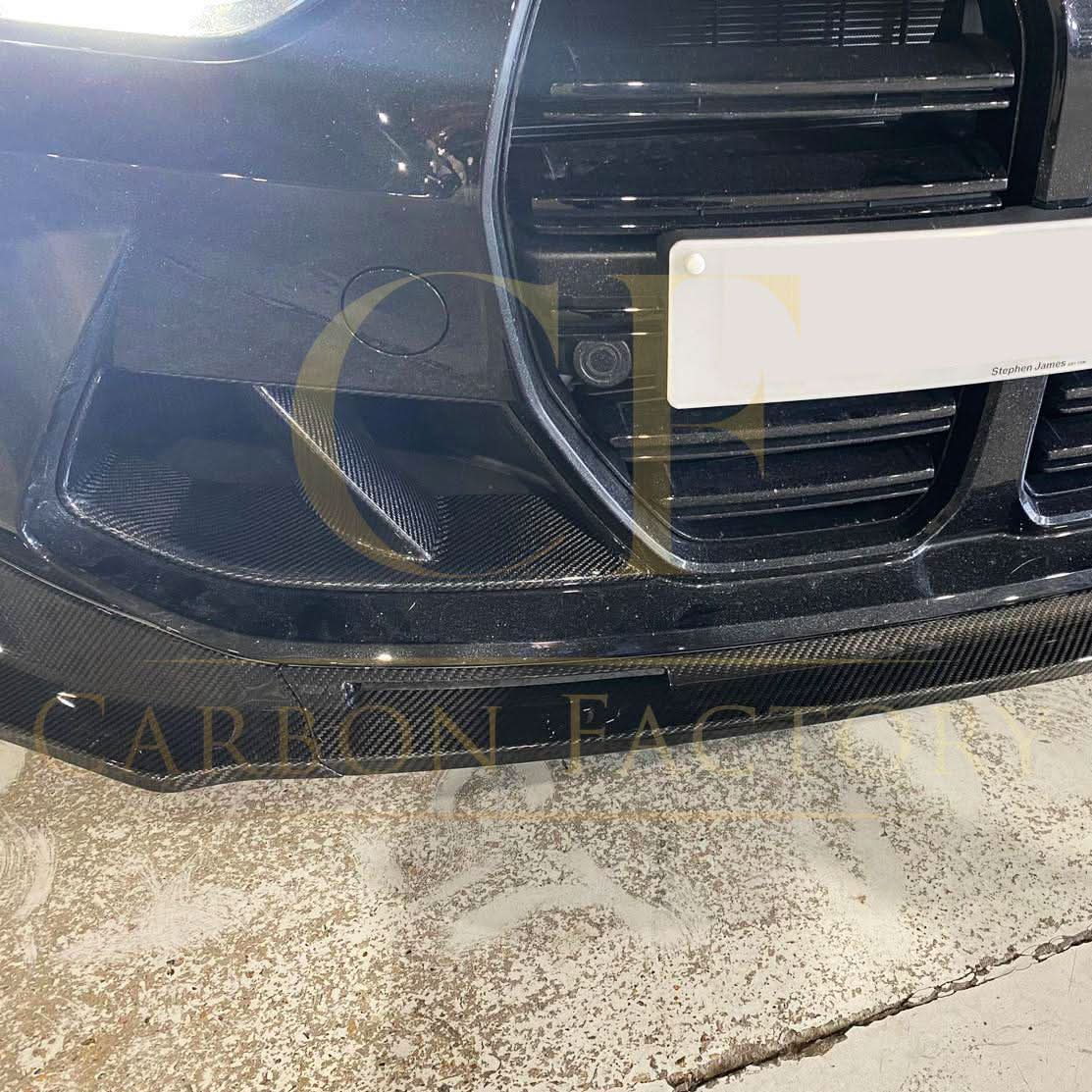 Carbon fibre front bumper inserts for BMW G80 M3, G82 M4, and G83 M4 exterior trims, showing sleek carbon fibre finish.