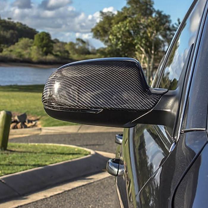 Carbon fibre mirror covers for Audi C7 A6 S6 RS6 2012-2018, stylish replacement accessory for side mirrors.