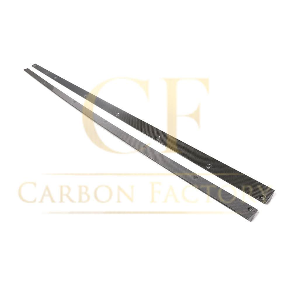 AMG-style carbon fibre side skirts for Mercedes C238 E-Class Coupe, enhance sporty look with sleek carbon fibre finish.
