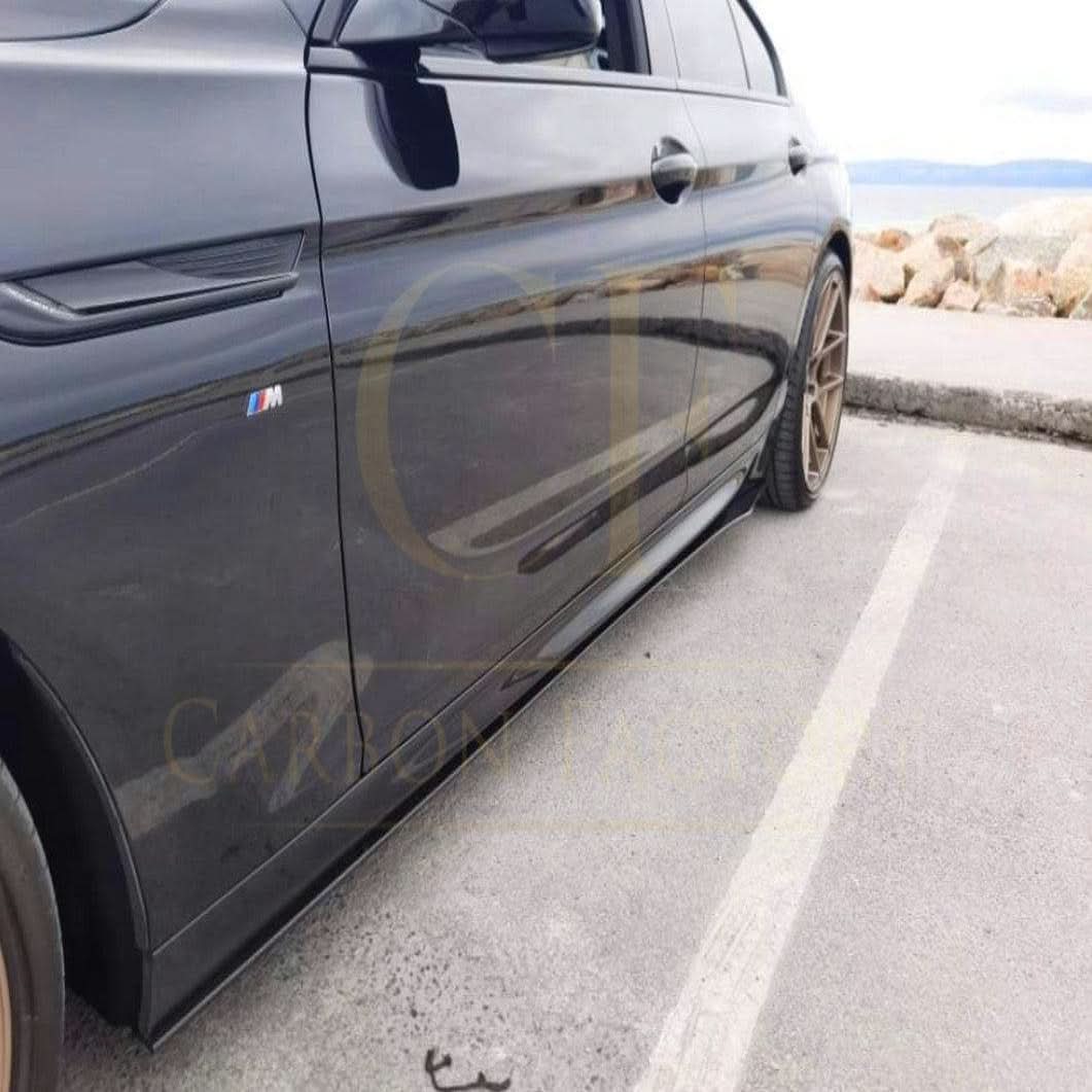 A close-up of a black carbon fibre side skirt for cars, showcasing the sleek, lightweight design from A Style Universal.
