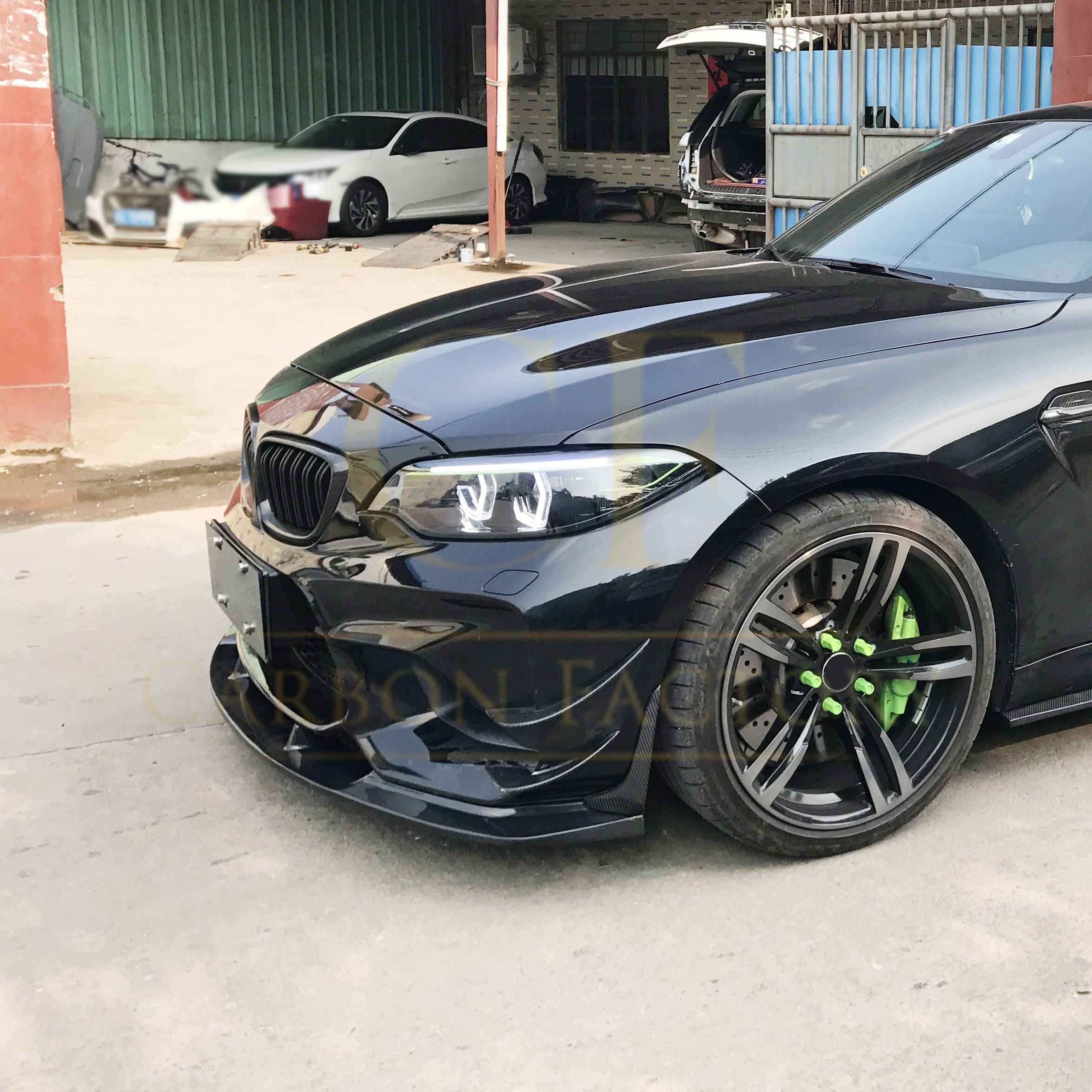 3D style carbon fiber front splitter for BMW F87 M2 OG 2016-2018, enhancing aerodynamics and sporty appearance.