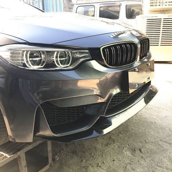 GTS style carbon fibre front splitter for BMW F80 M3 F82 F83 M4 models from 2014 to 2020, showcasing its aerodynamic design.