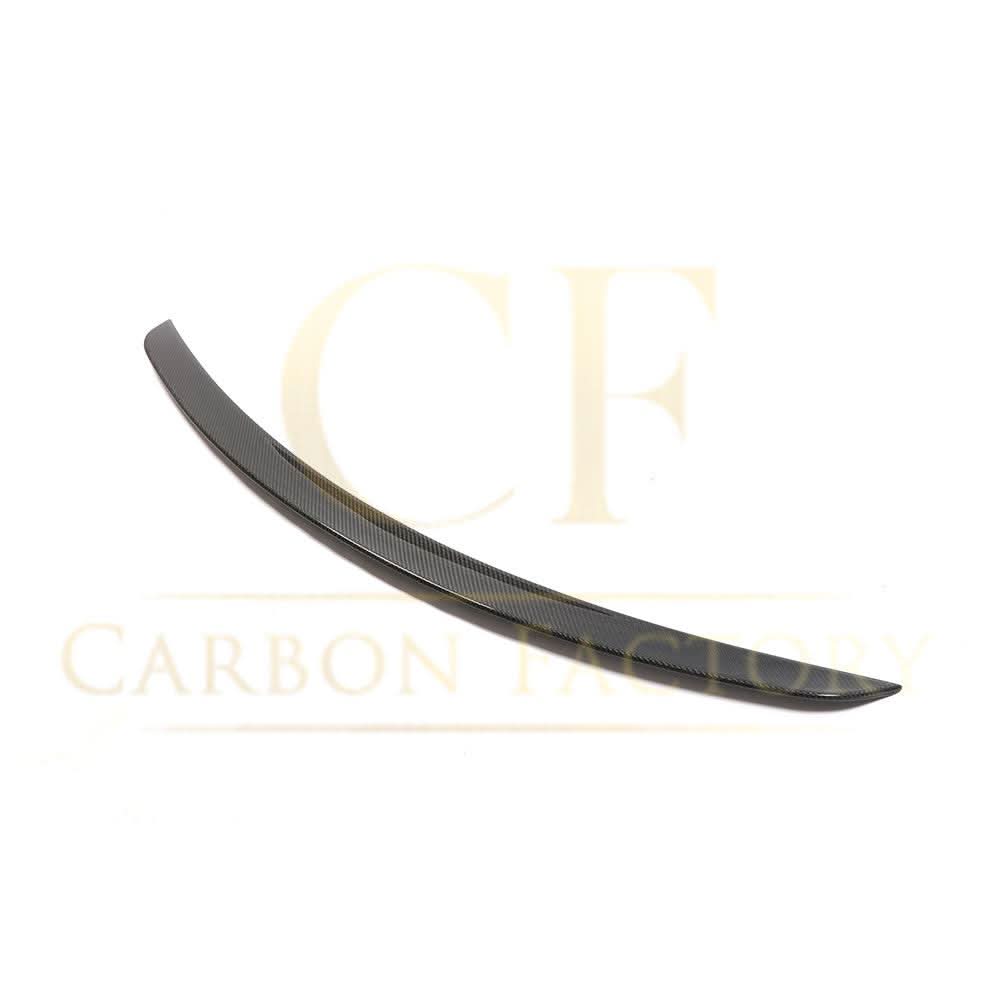 AMG-style carbon fiber boot spoiler for Mercedes-Benz C257 CLS 2019-present, showcasing sleek, aerodynamic design on the rear of the vehicle.